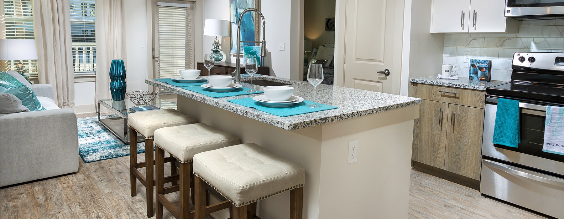 Sea Glassa kitchen with an island and chairs